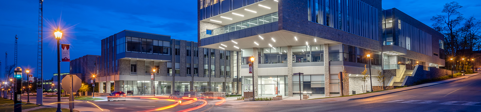 FIMS & Nursing Building exterior at night
