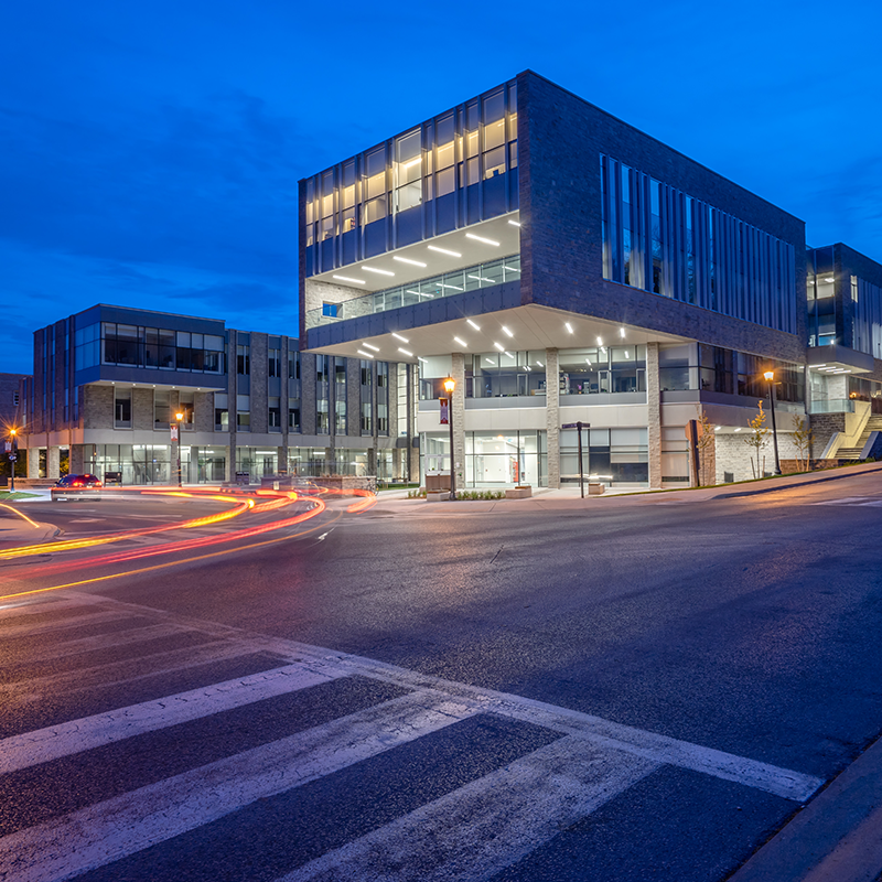 FIMS & Nursing Building exterior at night