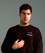 Media photo of Jeremy Dutcher in a dark coloured sweater.