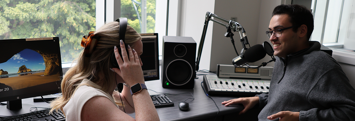Students working in an audio booth