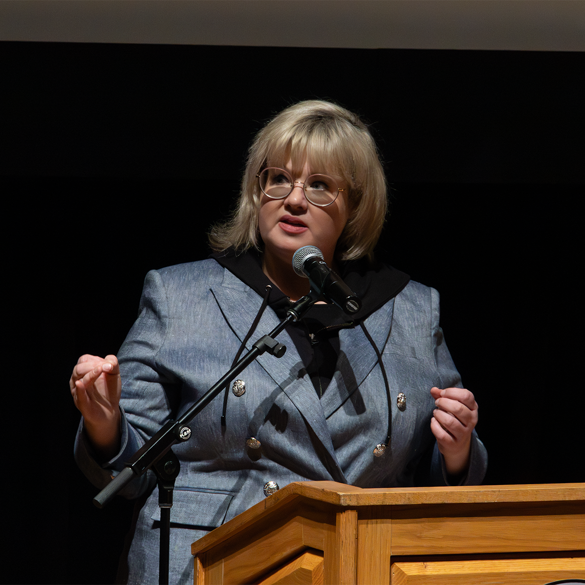 Katie Simpson poised at the podium