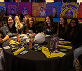 A table of MACS students enjoy dinner at the Wave during Careerchella.