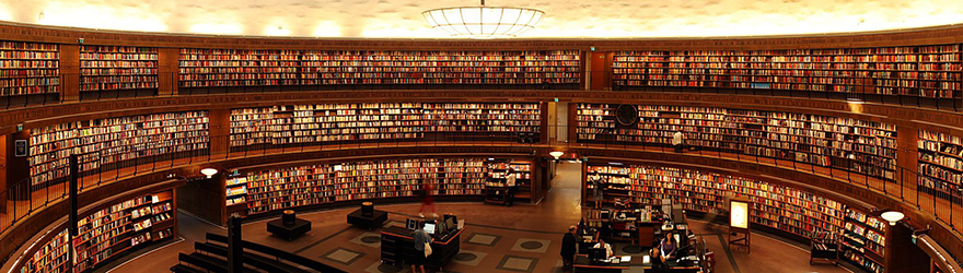 Large library with many books on shelves