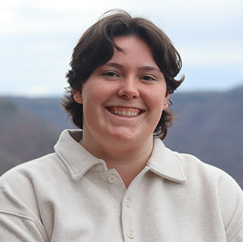 Photo of Vic Giguere standing outside