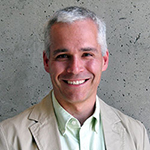 Headshot of James Compton