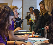 Students registering for the conference