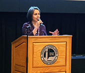 Natalie Diezyn (BA'21) speaks from the podium during her breakout session.