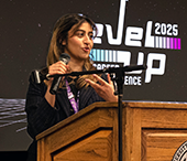 Skylar Gomes (BA'21) speaks from the podium during her breakout session.