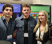Conference attendees stop for a photo between sessions.