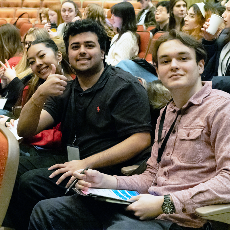 FIMS students sitting in an auditorium