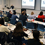 Students attend a lecture for a required course.